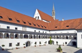 Kartause Gaming Hotel, © www.imagefoto.at Inner courtyard of Gaming Charterhouse with arcades and red tiled roof.
