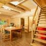 Kitchen-cum-living room with staircase to the bunk room, © Andreas Gruber Kitchen-cum-living room with staircase to the bunk room, © Andreas Gruber