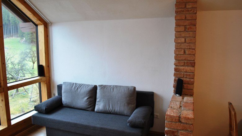 Sofa in the eat-in kitchen, © Patrick Leitner