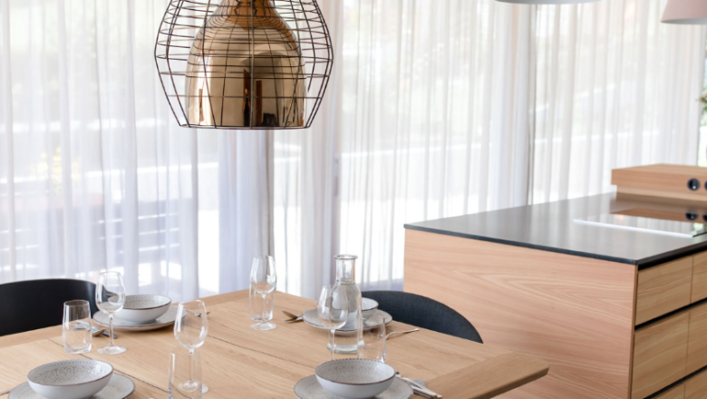 The Seekopf apartment impresses with its very modern design.
It was planned and furnished by M&G - Member of Formdepot.
It offers space for 4 people. The two bedrooms share a modern bathroom with rain shower.
The Seekopf apartment also has an extra WC. The spacious living/kitchen area with a view of the terrace and garden leaves nothing to be desired. The kitchen is equipped with a beautiful kitchen block, dishwasher, fully automatic coffee machine and kettle.

Relax here with your family or friends., &copy; Sophie Kirchner