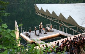 Concert on the Lunz am See stage with audience and musicians.