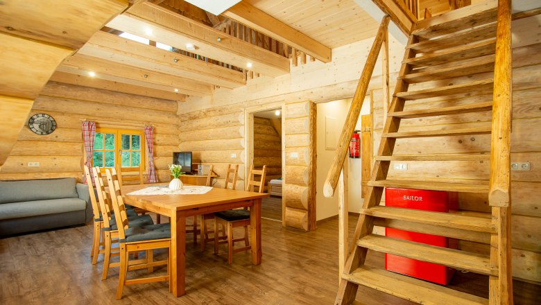 Kitchen-cum-living room with staircase to the bunk room, © Andreas Gruber